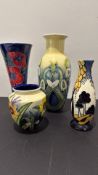 Four Old Tupton Ware hand-painted tube-lined pottery vases