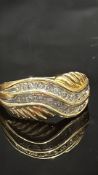 14ct Gold ring set with 24 diamonds Weight 5g Size