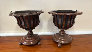 Pair of Victorian mahogany slatted urn jardinieres