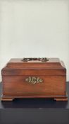 Georgian mahogany three division tea caddy with br