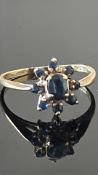 9ct Gold ring set with sapphires Weight 1.5g Size