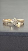 9ct Gold ring set with 7 small diamonds 1.8g Size