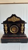 Ebonised slate and rouge marble mantel clock, architectural case with gilt bronze caryatids,