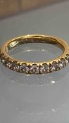 18ct Gold Half eternity ring set with 10 diamonds, each diamond approx 3/15ct. Approx 2ct total