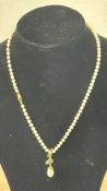 Pearl necklace with 9ct gold clasp & 14ct gold pen