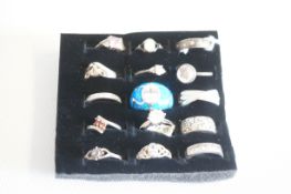 15 Silver rings on tray