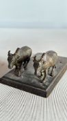 Miniature bronze double-ox sculpture