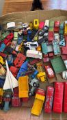 Box of vintage die-cast toy vehicles