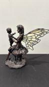 Resin fairy and child figure with stained-glass wings