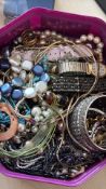 Large unsorted box of costume jewellery