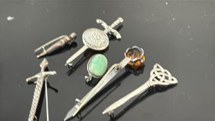 Collection of silver pin brooches