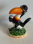 Cast iron guinness toucan