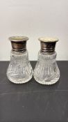 Pair of Edwardian cut crystal pepperettes, tapering hobnail bodies with star-cut bases, sterling
