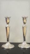 Reed & Barton pair of silver candle sticks Total w