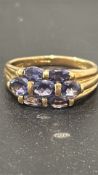 9ct Gold ring set with 7 amethyst Size R Weight 3.3g