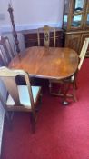 Early 20th-c. mahogany dining table and four inlaid chairs