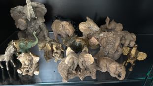 Collection of seventeen decorative elephant figurines