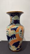 Chinese slip-decorated dragon stoneware vase