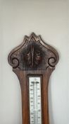 oak banjo-shaped wall barometer with porcelainised aneroid dial and mercury thermometer, weather