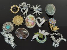 Bag of costume jewellery brooches