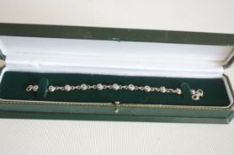 Boxed silver bracelet set with 11 stones