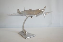Large chrome spitfire on stand