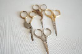 4 Pairs of ornate scissors