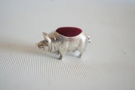 Silver pig pin cushion