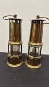 Pair of brass electric minerâ€™s safety lamps