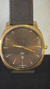 Swiss Mathey-Tissot “1886” wristwatch; gold-plated cushion case, brown sunburst dial with baton
