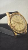 Circa 1950s Watra wristwatch, manual-wind movement with 17 jewels, gilt case, cream dial with