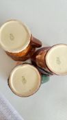 Royal Doulton stoneware character jugs, trio