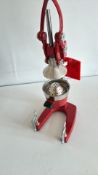 Smirnoff branded manual citrus press