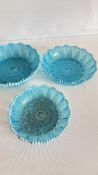 Three blue opalescent pressed glass bowls