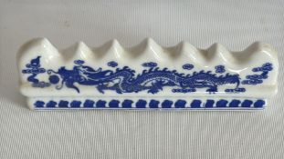 Chinese blue and white porcelain dragon brush rest