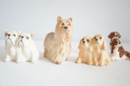 4 Small Beswick dogs