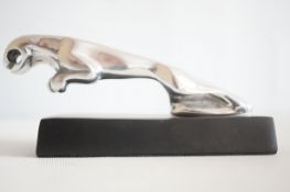 Chrome jaguar car mascot on base
