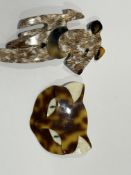 Lea stein dog brooch together with a lea stein cat