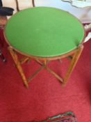 Revertable reverting card table