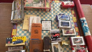 Mixed lot of boxed die-cast vehicles, vintage board game board, maps and ephemera