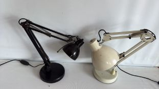Two articulated metal desk lamps