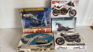 Group of five scale model aircraft and motorcycle kits