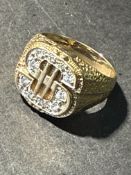 9ct Gold gents dollar ring set with white gem ston