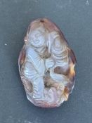 Oriental carved soapstone buddha