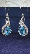 9ct White gold blue topaz & diamond earrings