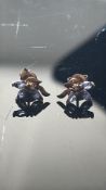 Pair of 9ct gold earrings set with blue stone Weig