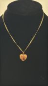 9ct Gold chain with heart shaped locket photo pend