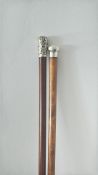 2 Silver topped fully hallmarked walking sticks
