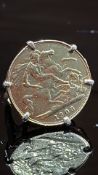 1903 Half sovereign mounted into a ring Total weig