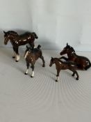 4 Beswick brown small horses